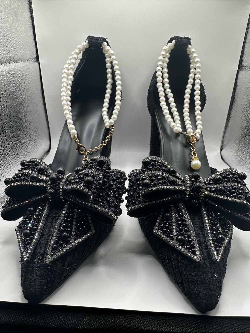 Pearl-Embellished Black Pointed Toe Heels with Bow Detail
